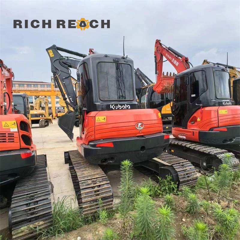 Side profile of a used 2025 Kubota KX165-5 excavator showing boom and arm, $18,056